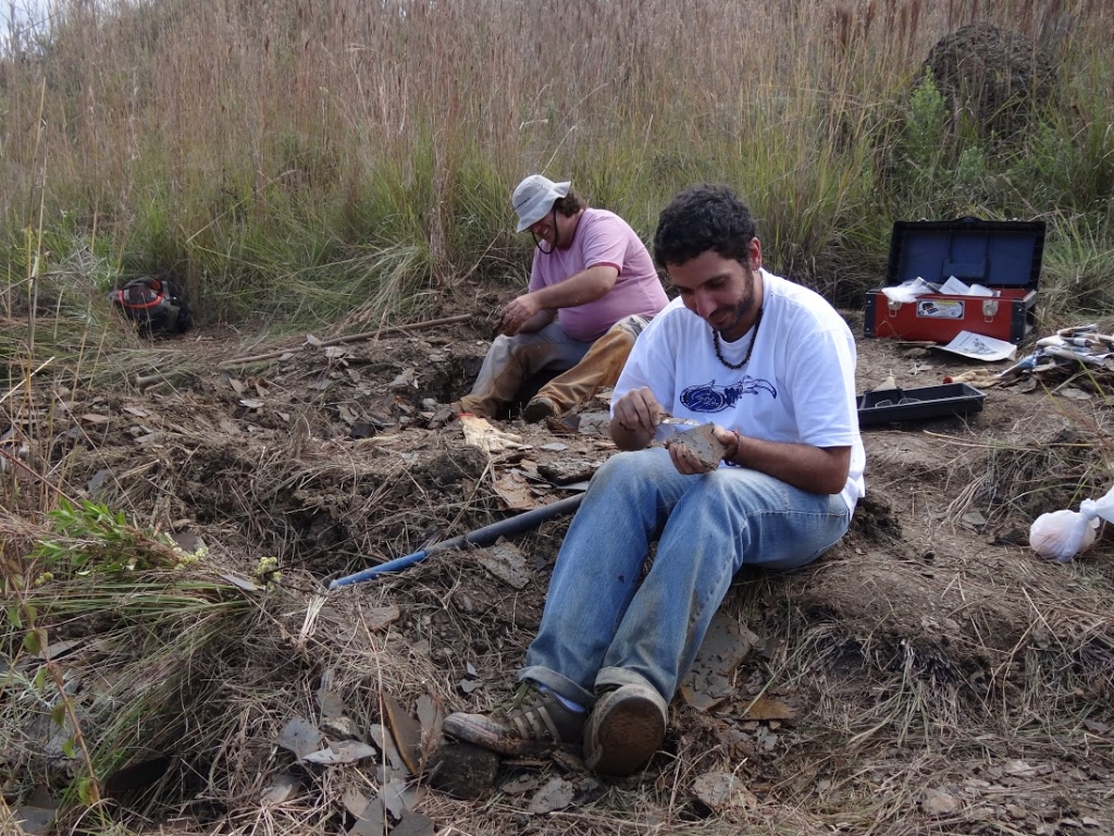 Renato and Felipe digging